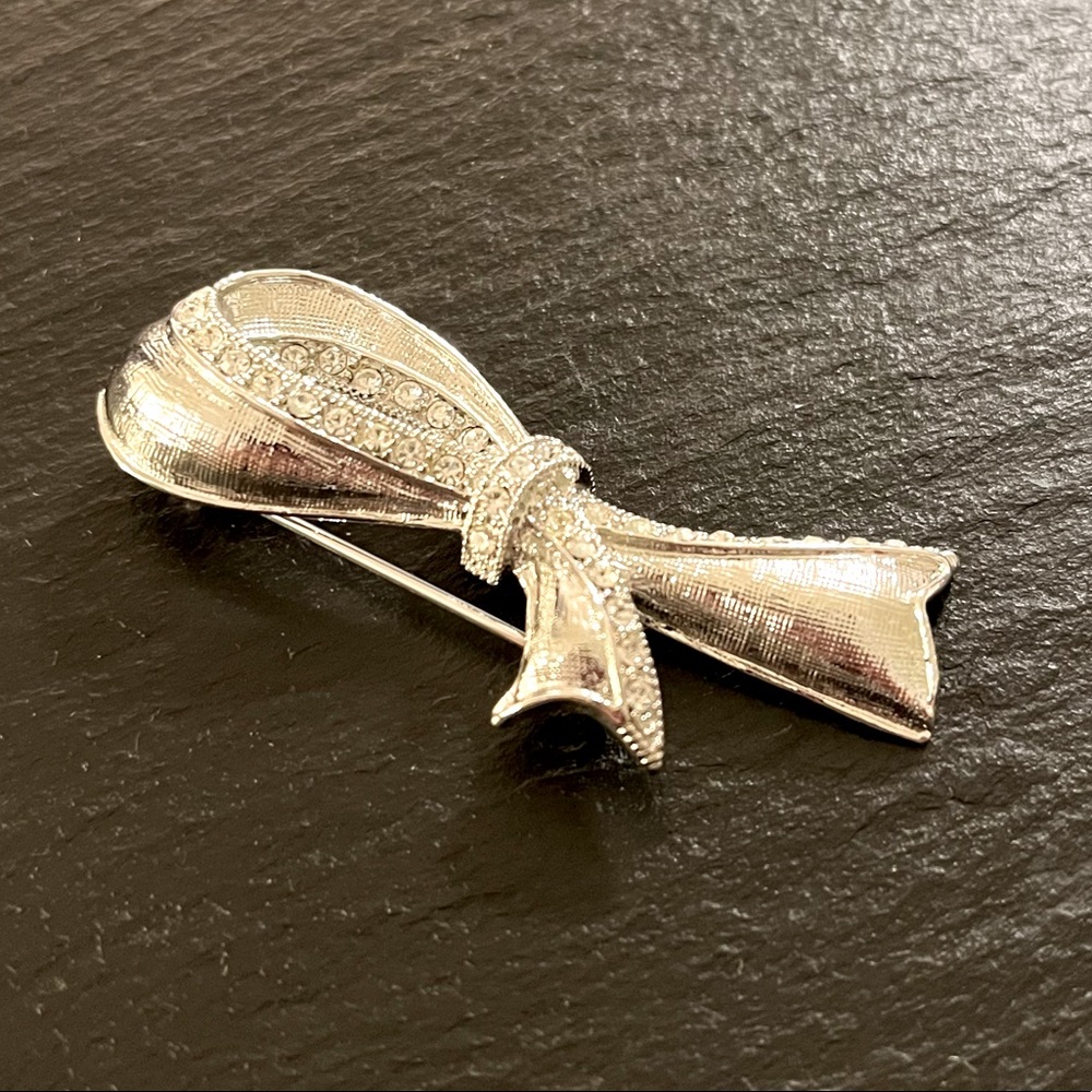 Silvertone Ribbon Rhinestone Accent Brooch - Picture 2 of 9